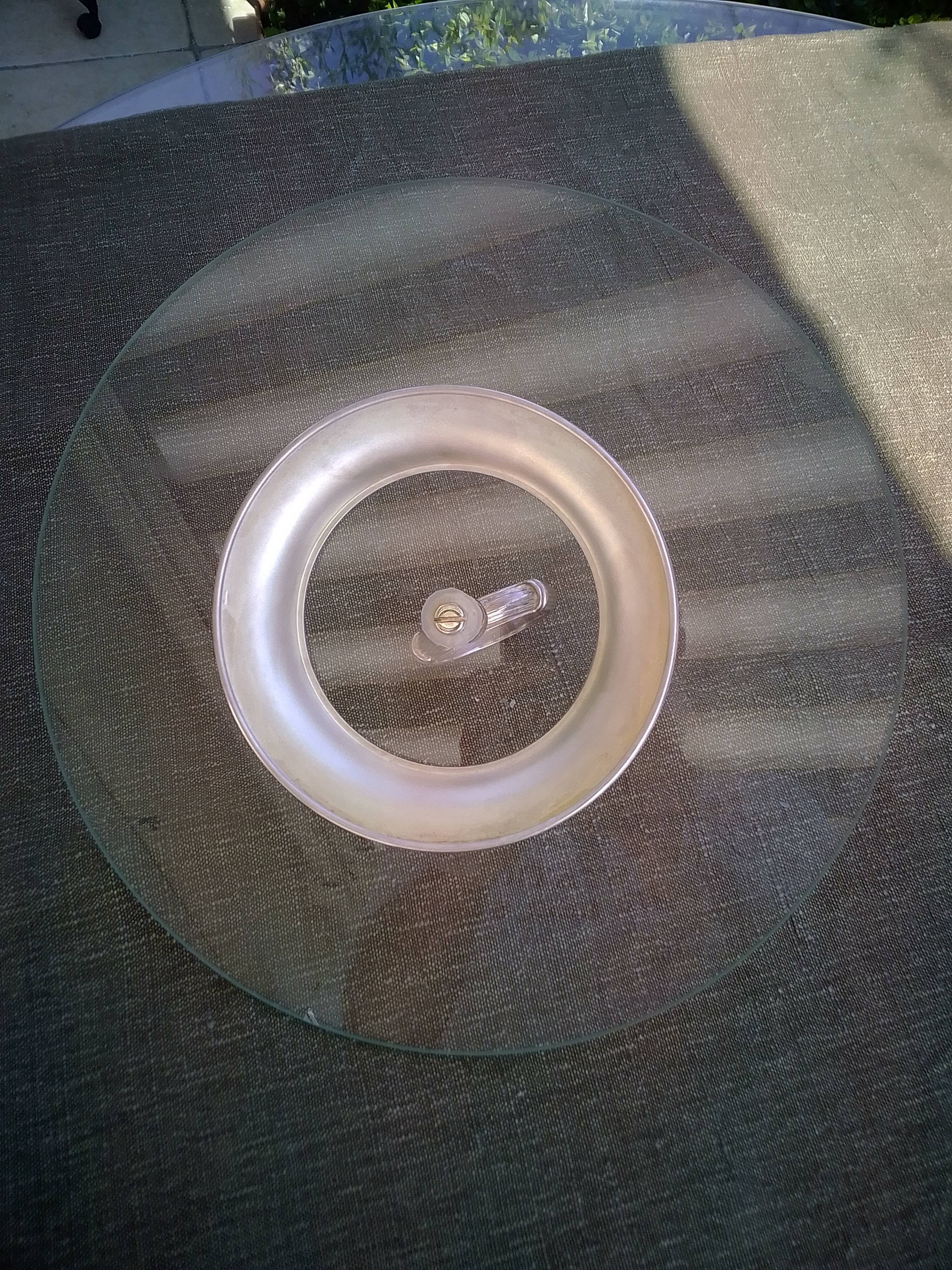 Glass and silver metal top