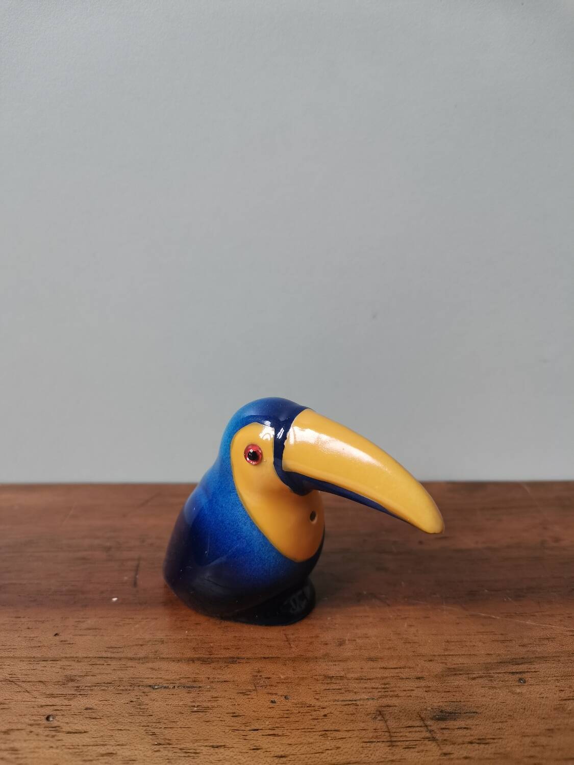 Vintage salt shaker in the shape of a toucan bird slip