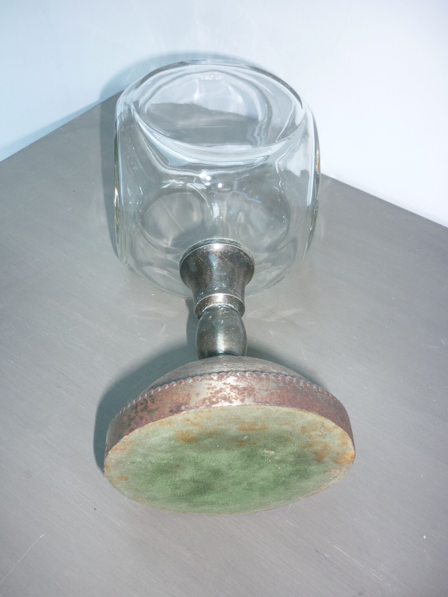 Vase or glass cup on silver stand