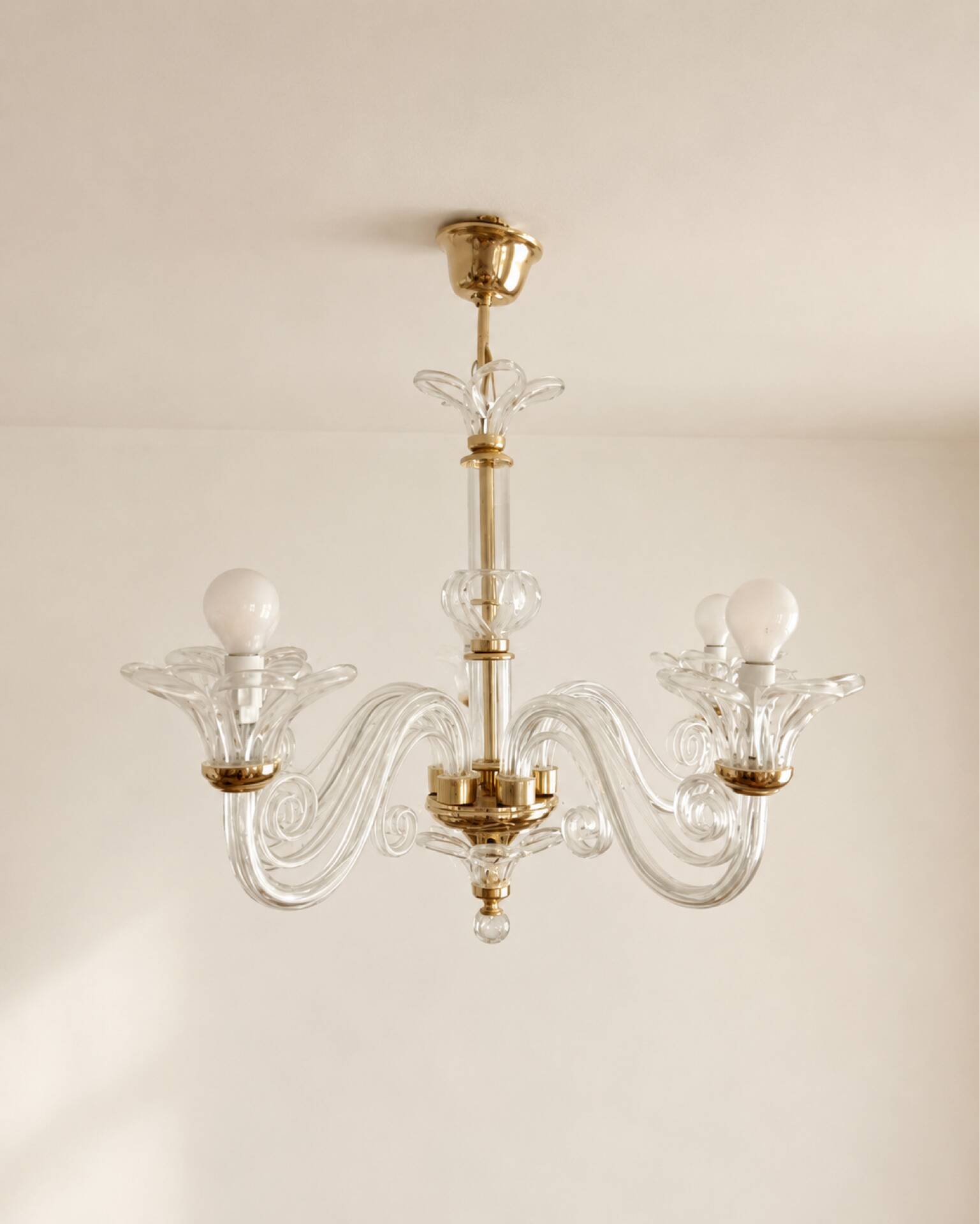 Vintage chandelier in transparent glass and gilded brass, Murano style.