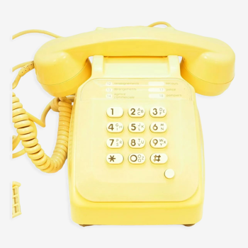 Vintage beige phone with keys