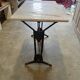 Antique bistro table in cast iron and marble.