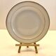 Service of 34 Limoges porcelain plates by Chastagner & Cie – Gilded borders.
