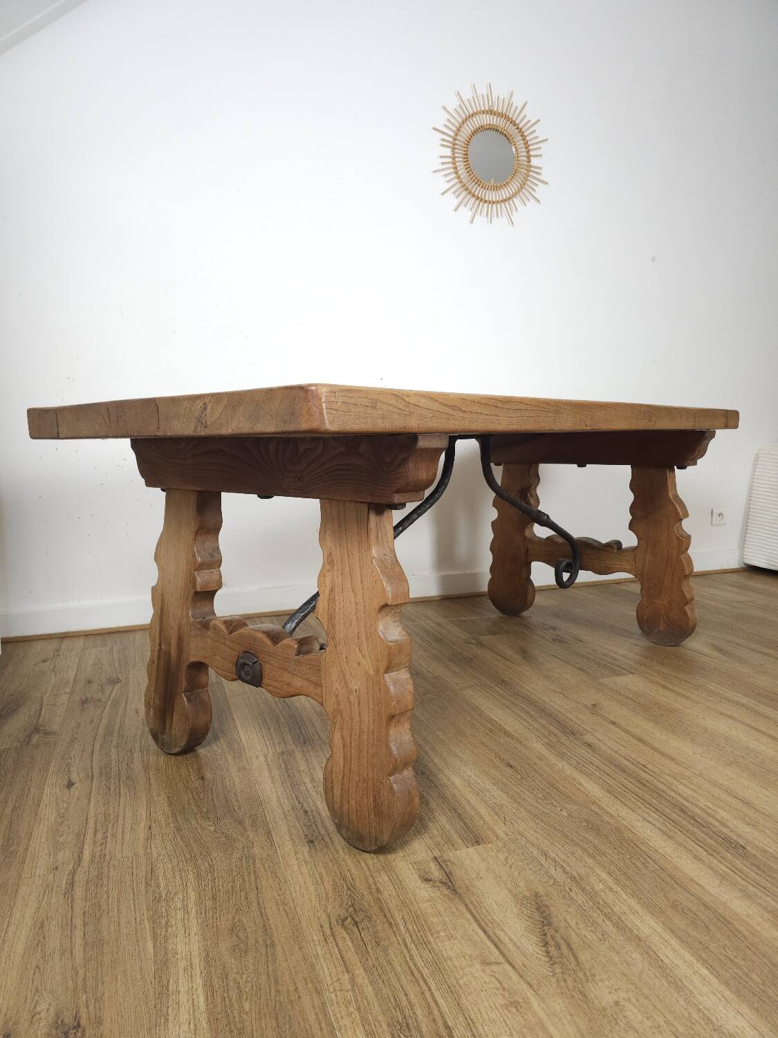 Rustic solid oak table with wrought iron, circa 1950.