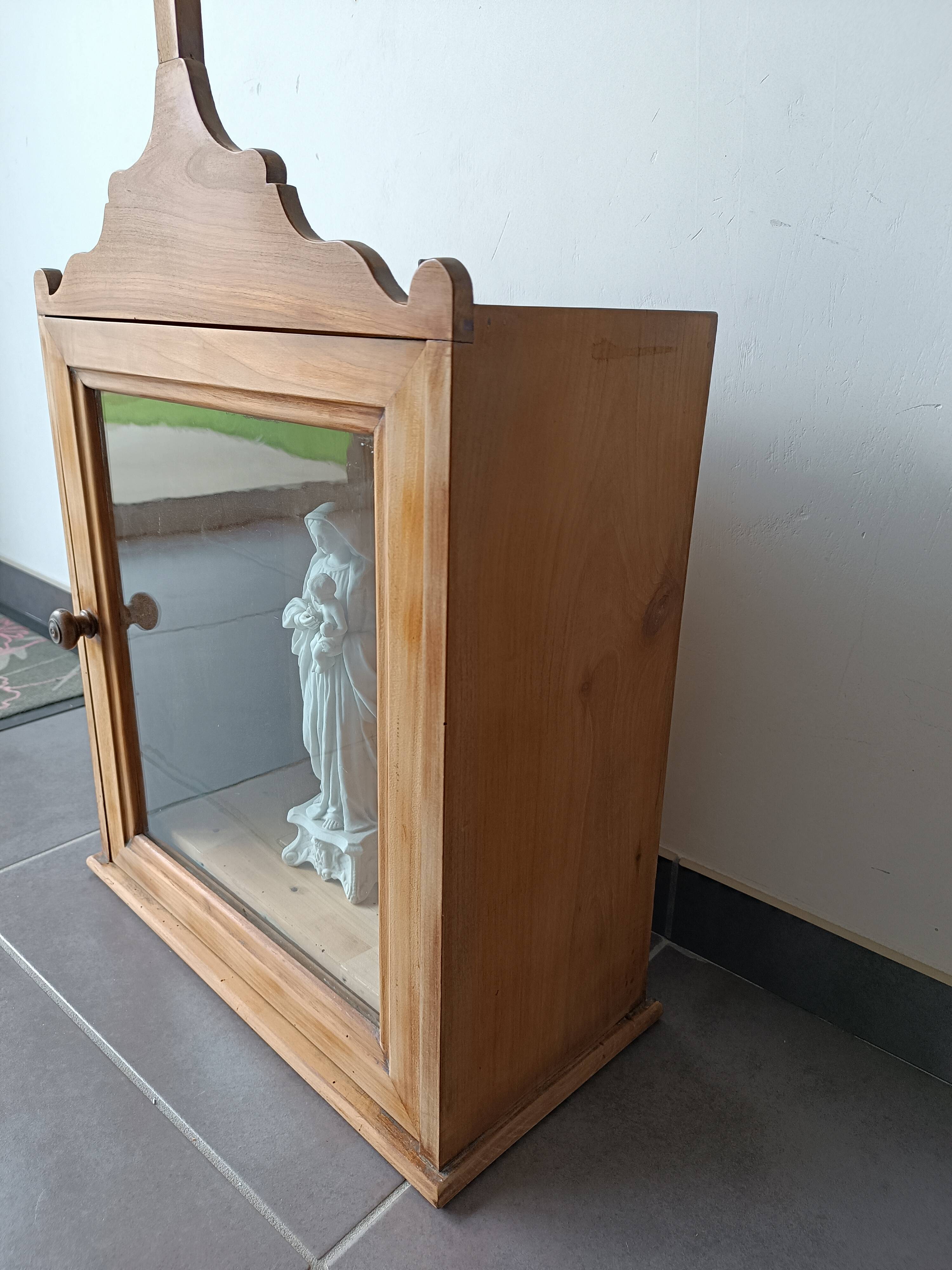 Old religious statuary display case
