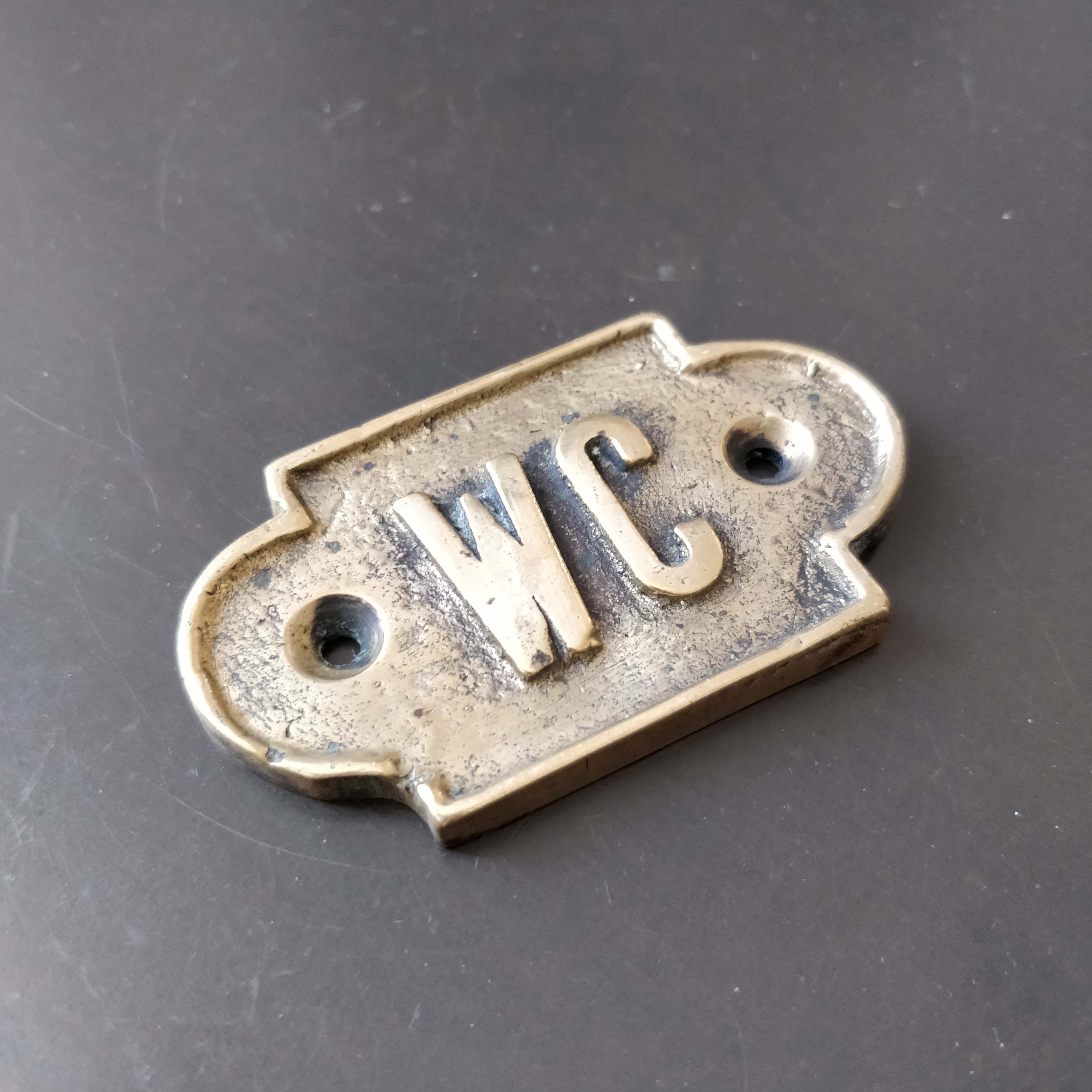 Brass toilet door plates