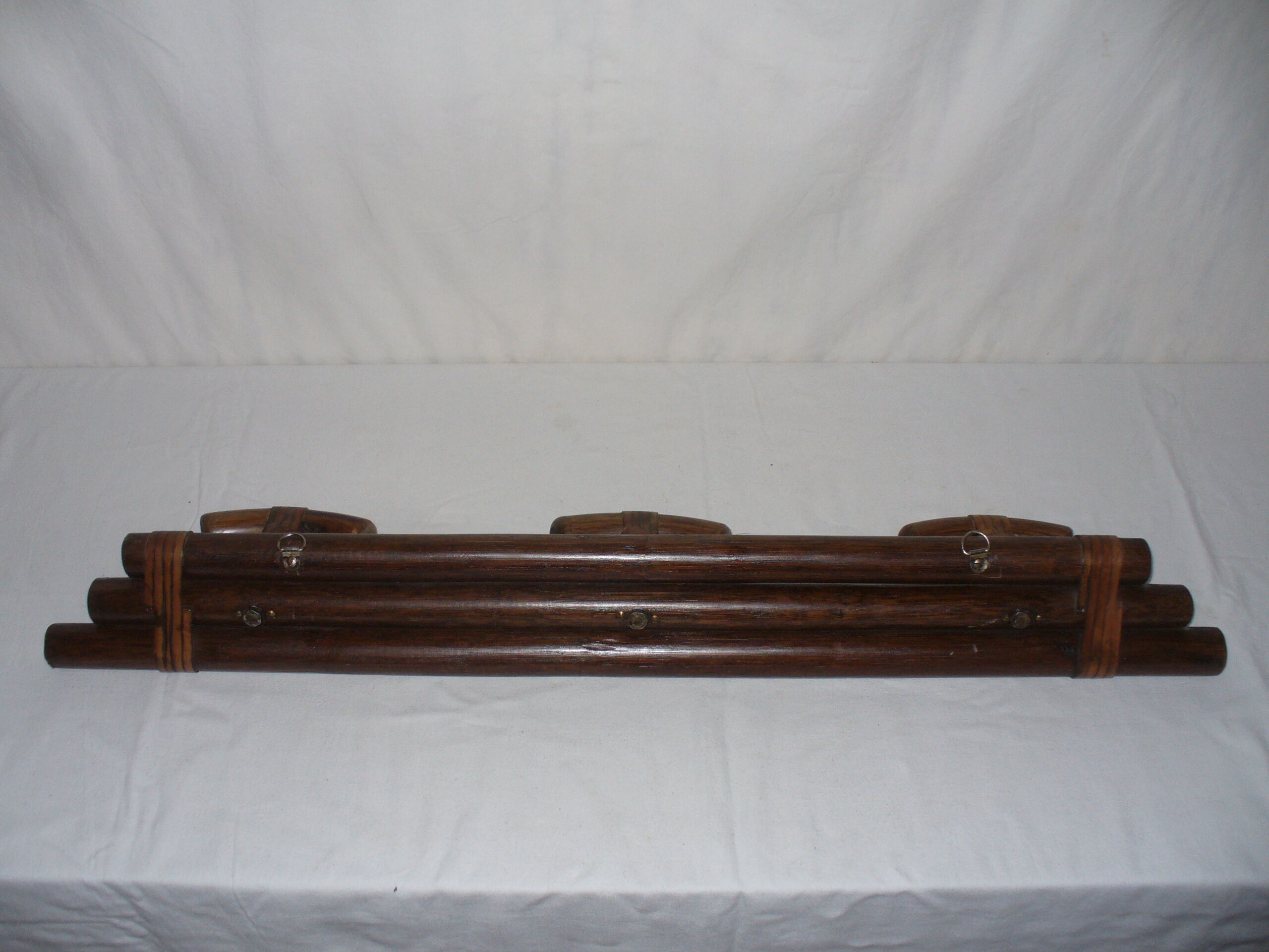 Leather and wood coat hanger