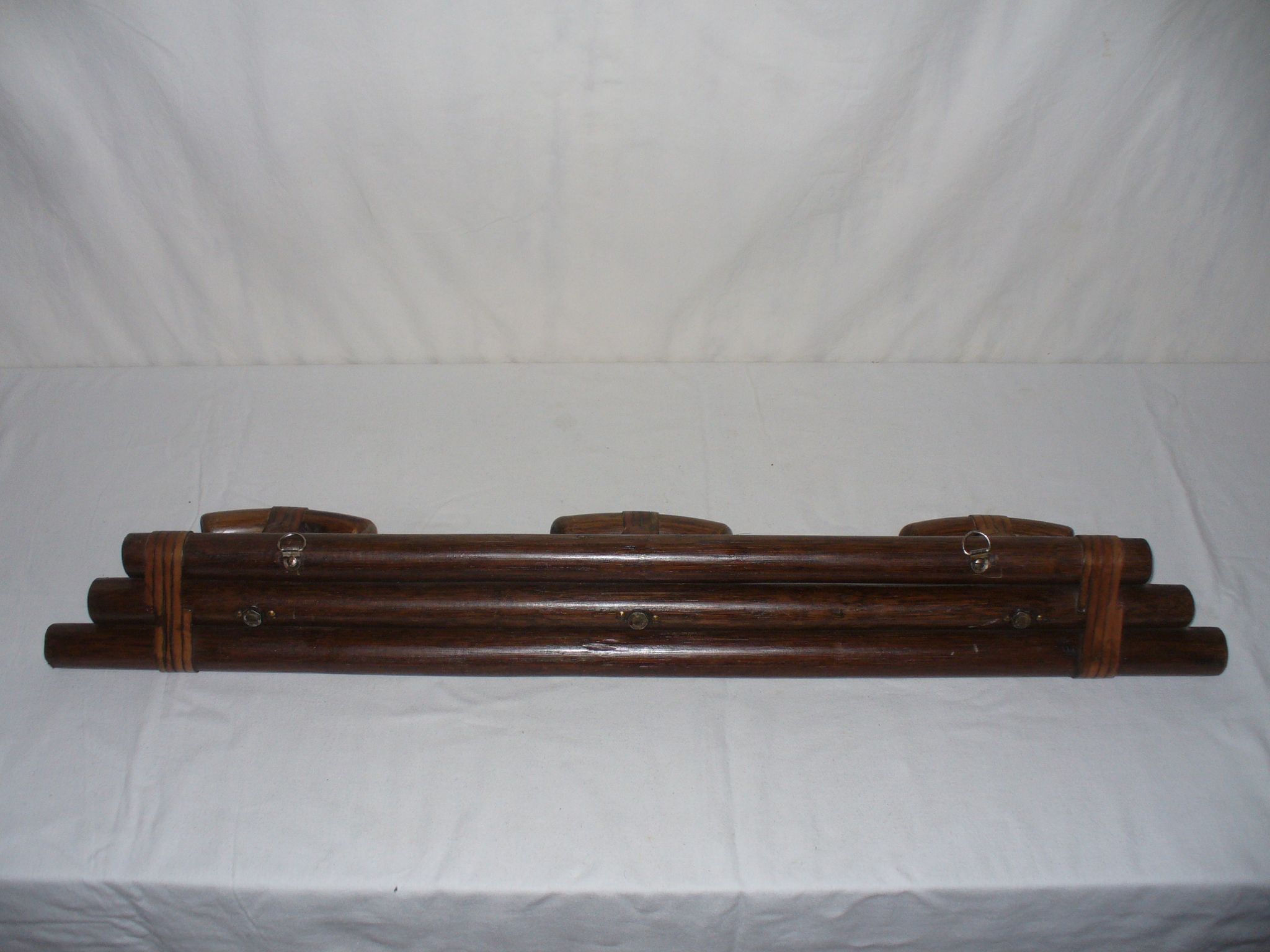 Leather and wood coat hanger