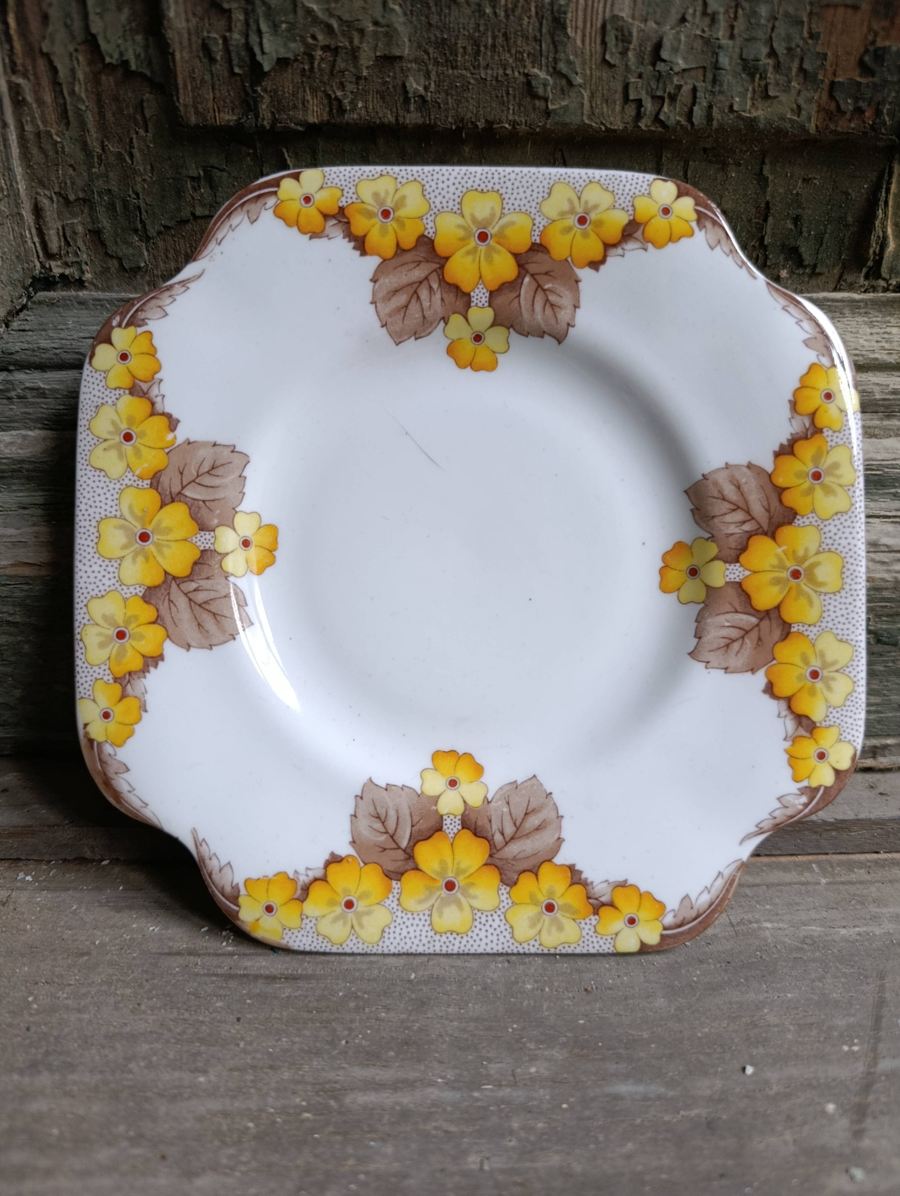 Set of two Caversham trios (cup, saucer and squared plate) , England, 1940s