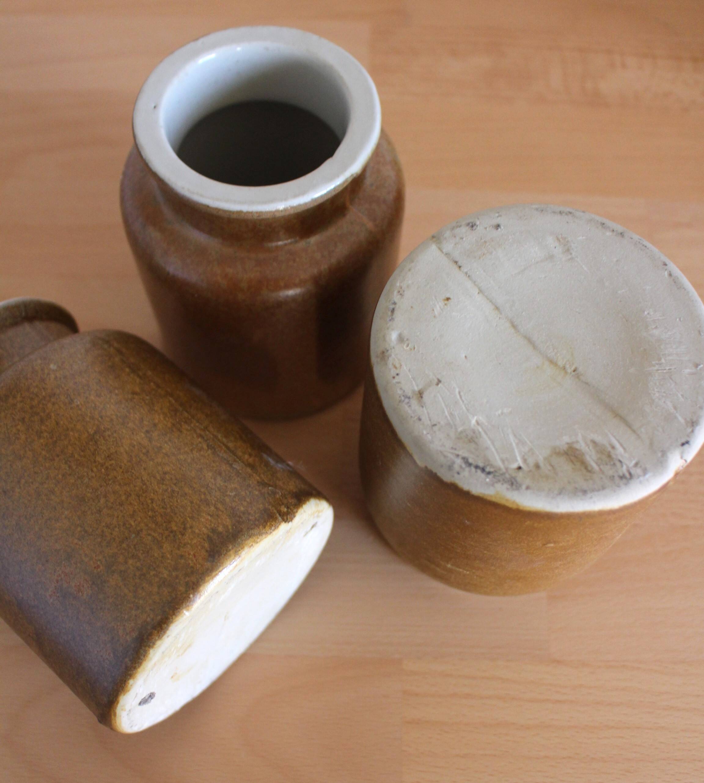 A set of 3 vintage glazed stoneware vases for indoor use.
