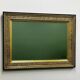 Vintage rectangular classical gold and black mirror. France, 1970s.