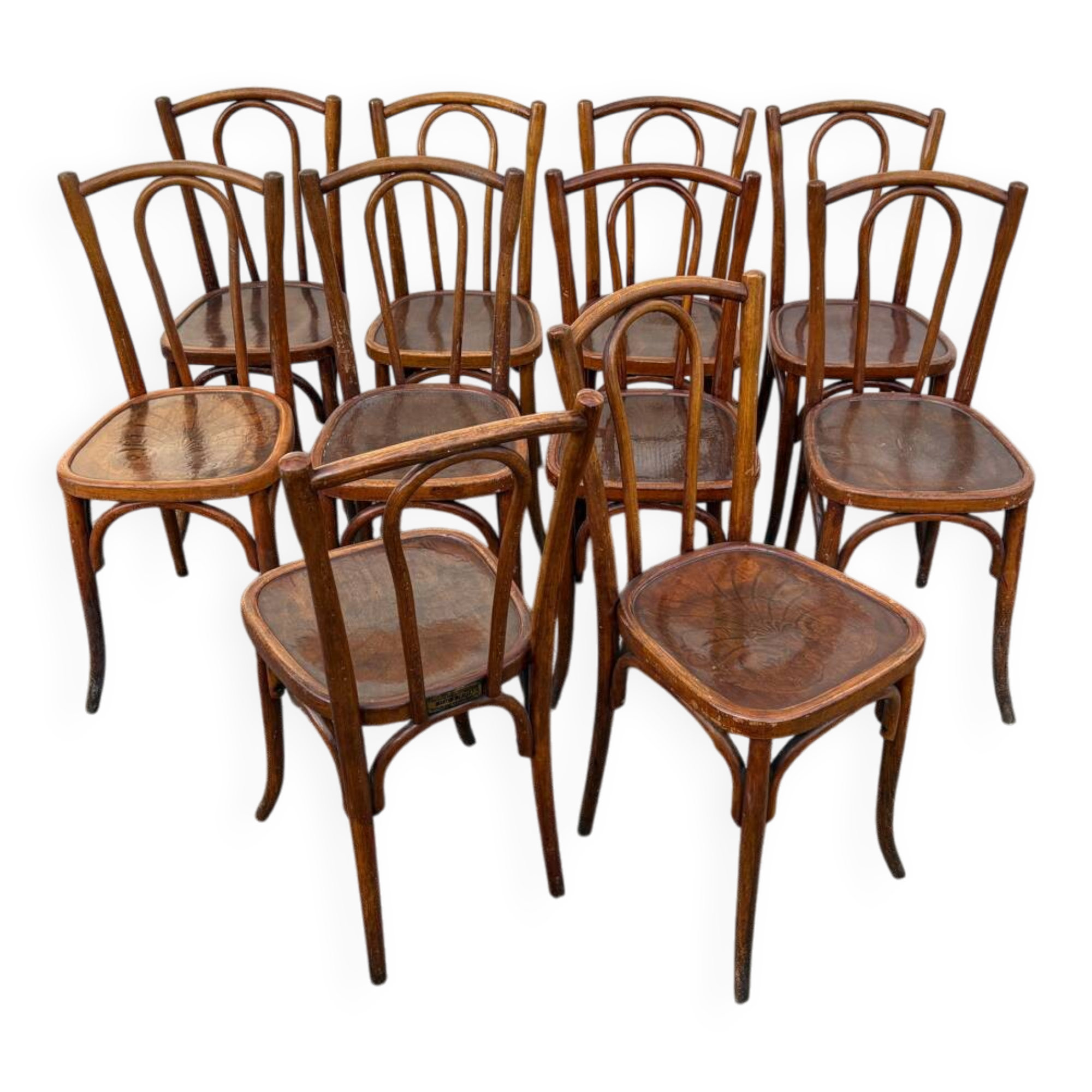 10 varnished patterned bistro chairs