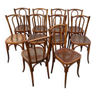 10 varnished patterned bistro chairs
