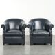 Set of dark blue cow leather club armchairs with a unique design