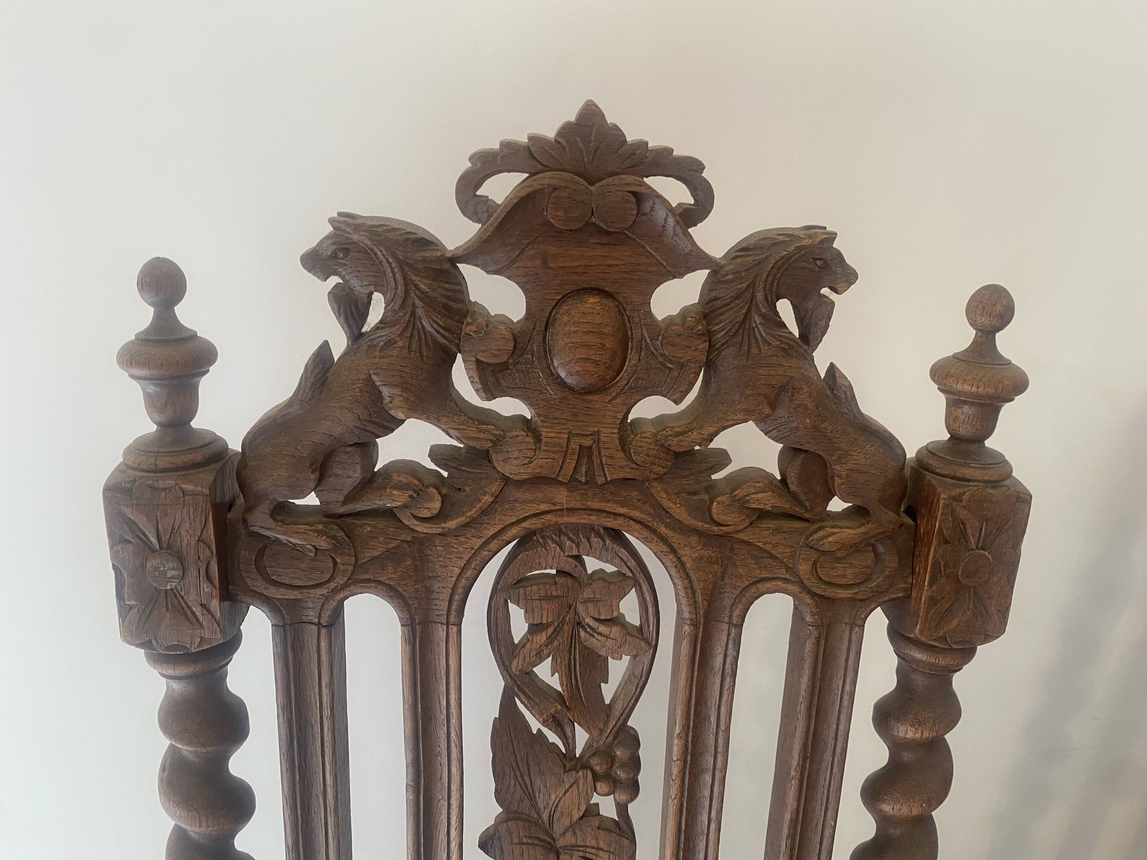 Pair of 2 Henri II neo-renaissance carved lion head chairs
