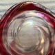 Empty pocket in pink tinted glass
