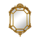 Antique octagonal mirror in richly carved gilded wood, Louis XV style.