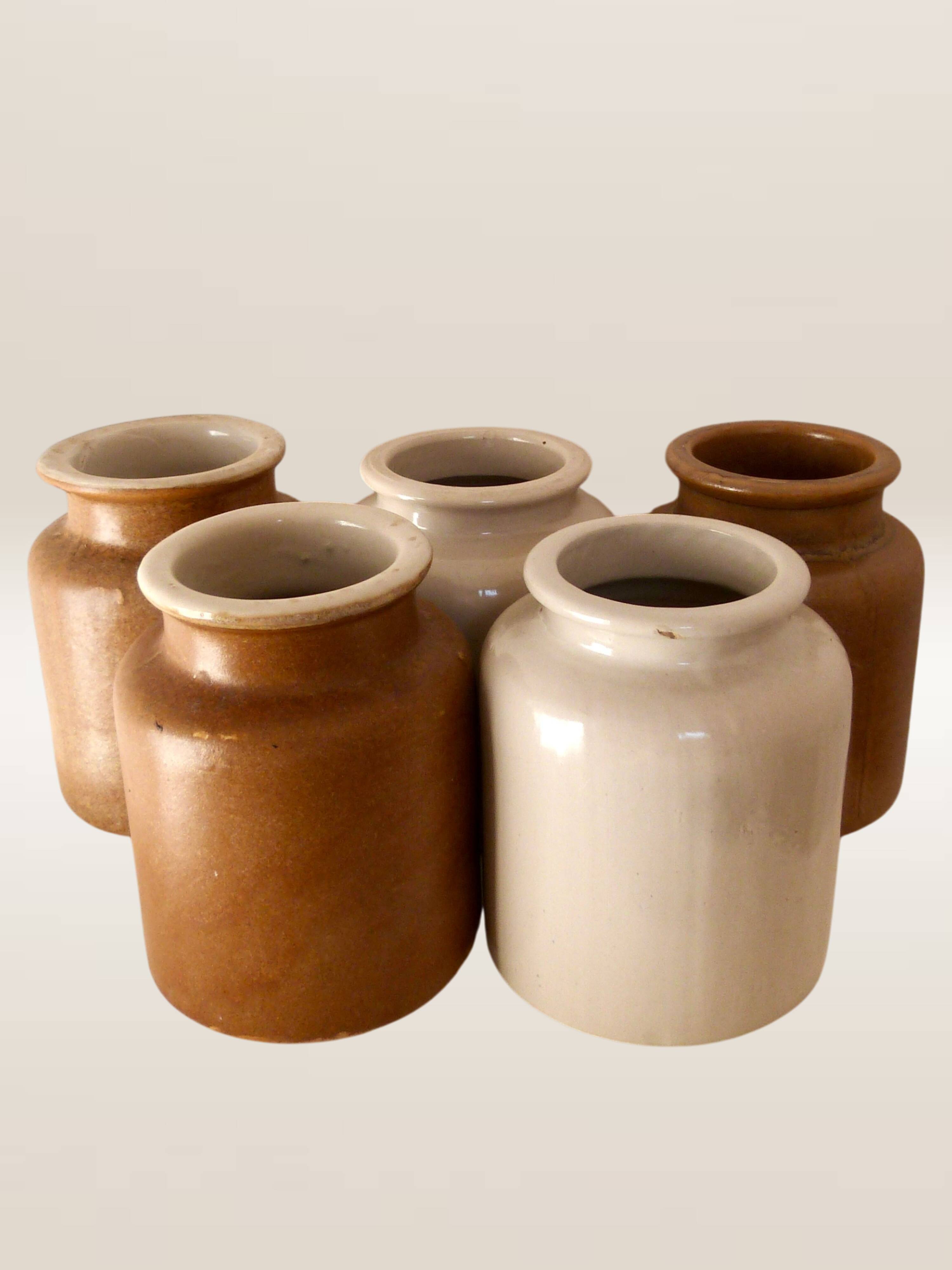 Set of five stoneware mustard pots