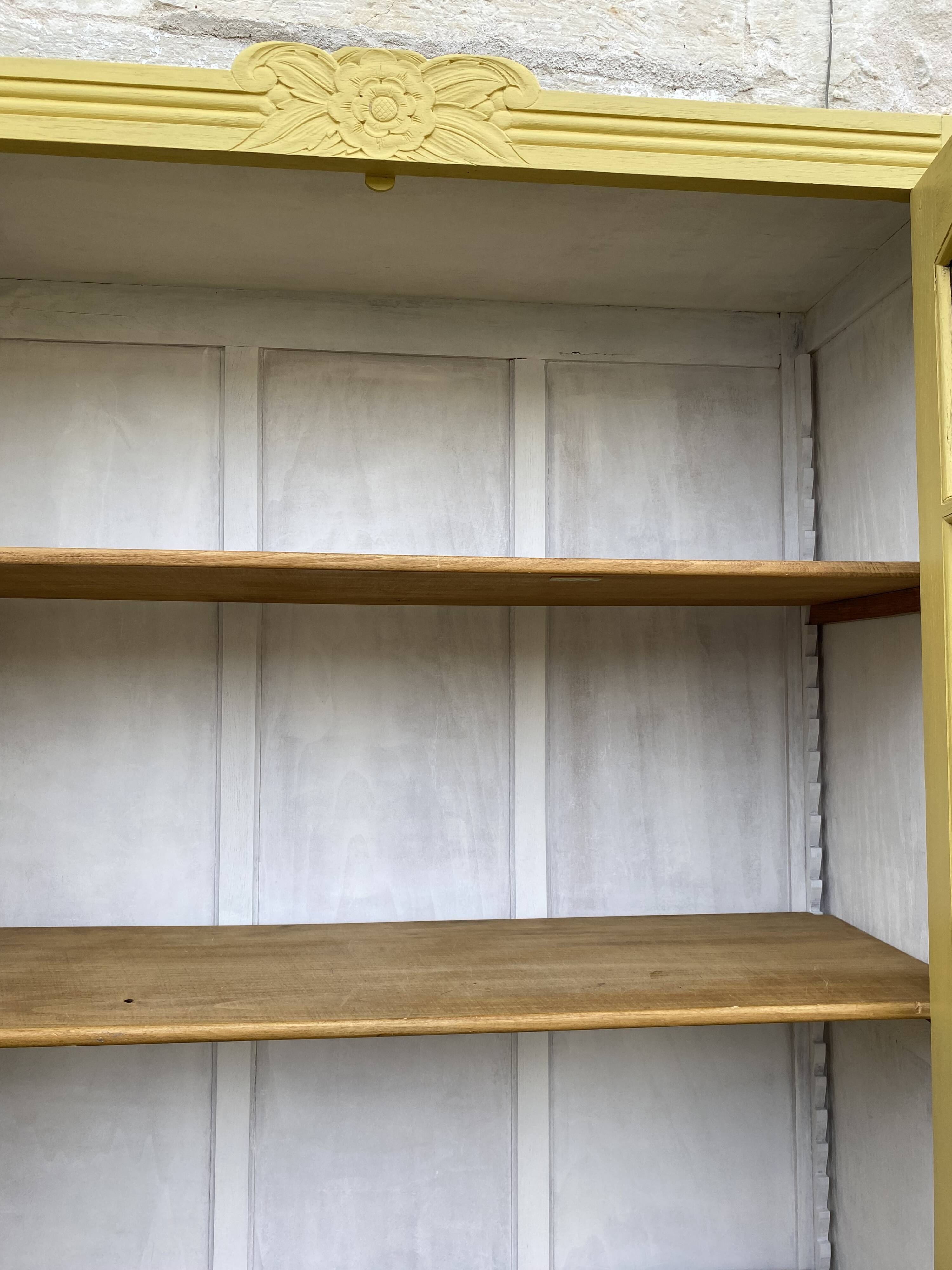 Antique yellow display cabinet