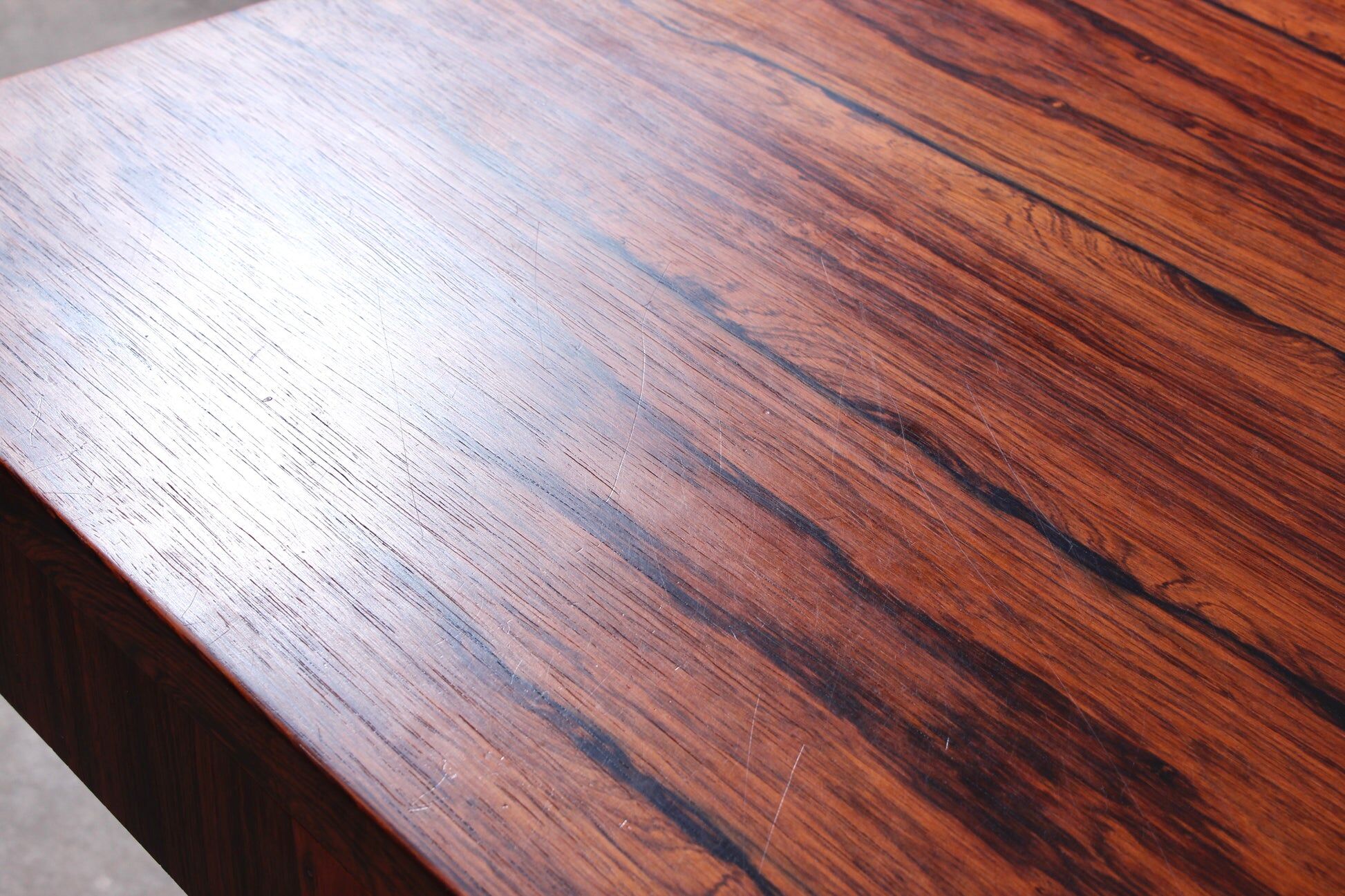 Minimalist rosewood desk by Riis Andersen