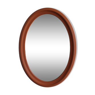 Terracotta patinated oval mirror