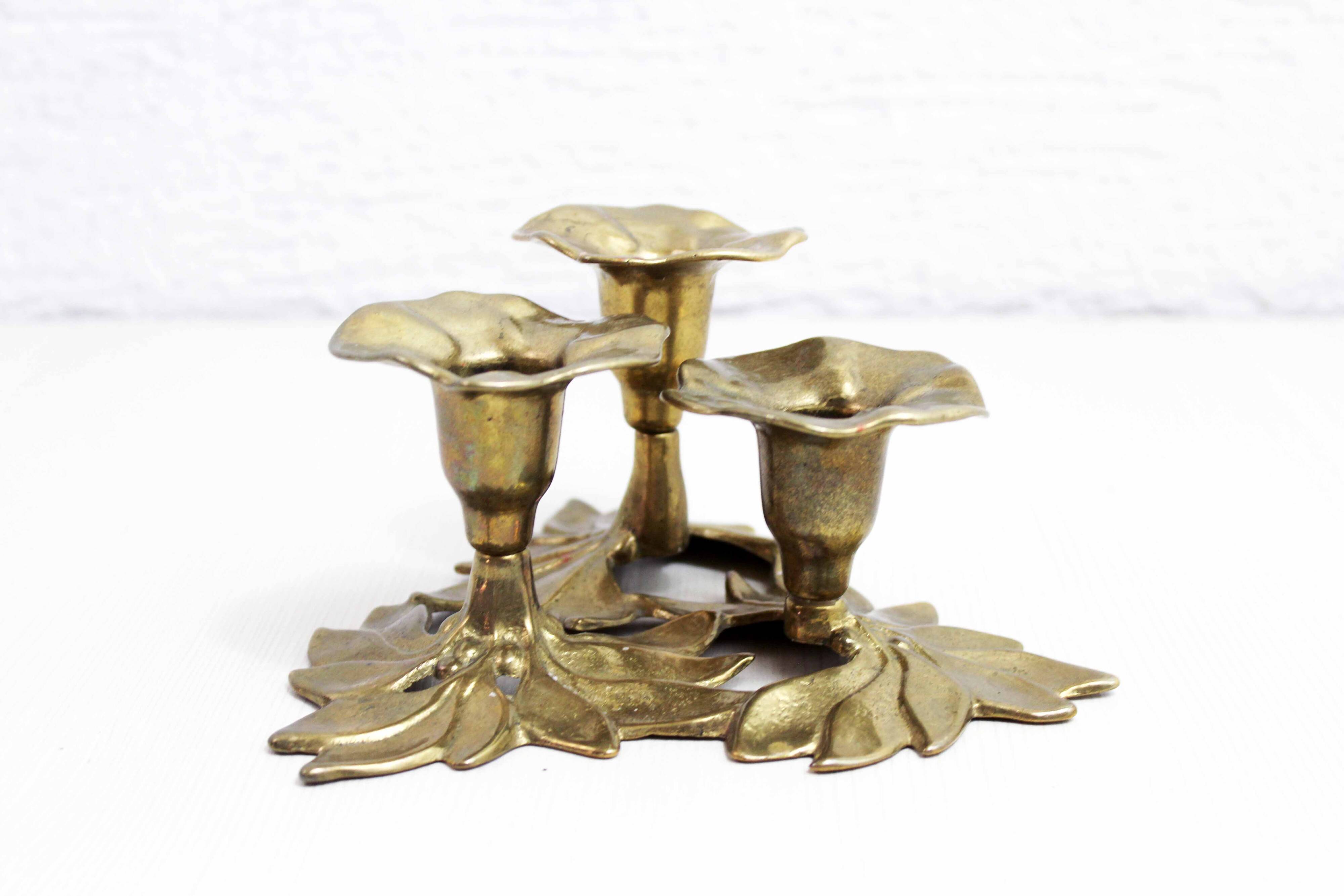 Brass flower candle holder