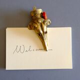 Ancient greyhound-headed mail clip, bronze