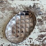 Silver-plated pineapple pocket emptier