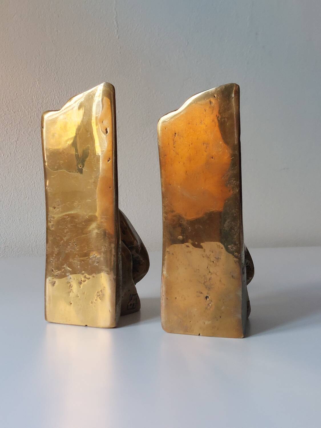 Super rare pair of brutalist brass bookends by David Marshall.