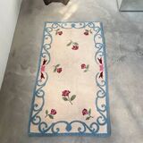 White and blue floral wool rug