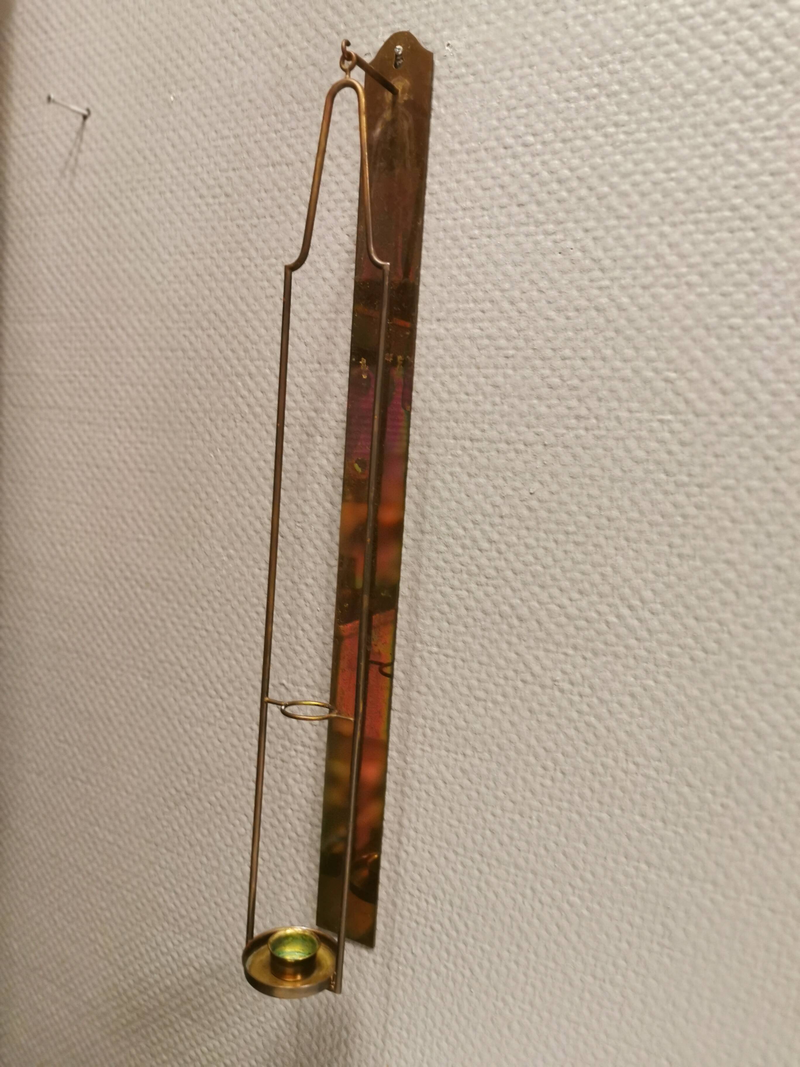 Old Wall hung brass candle holder.