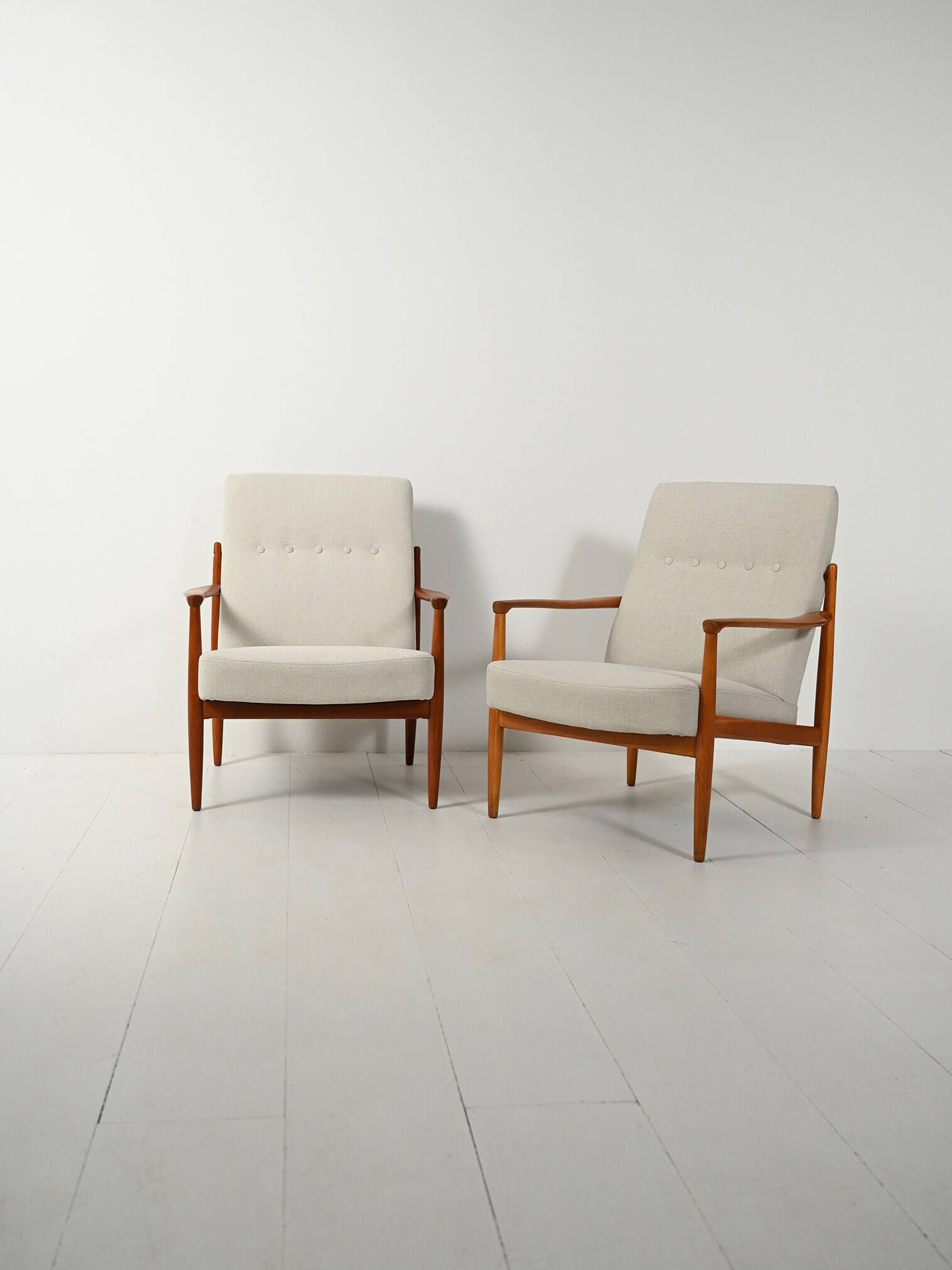 Pair of Scandinavian teak armchairs, 1950s–60s