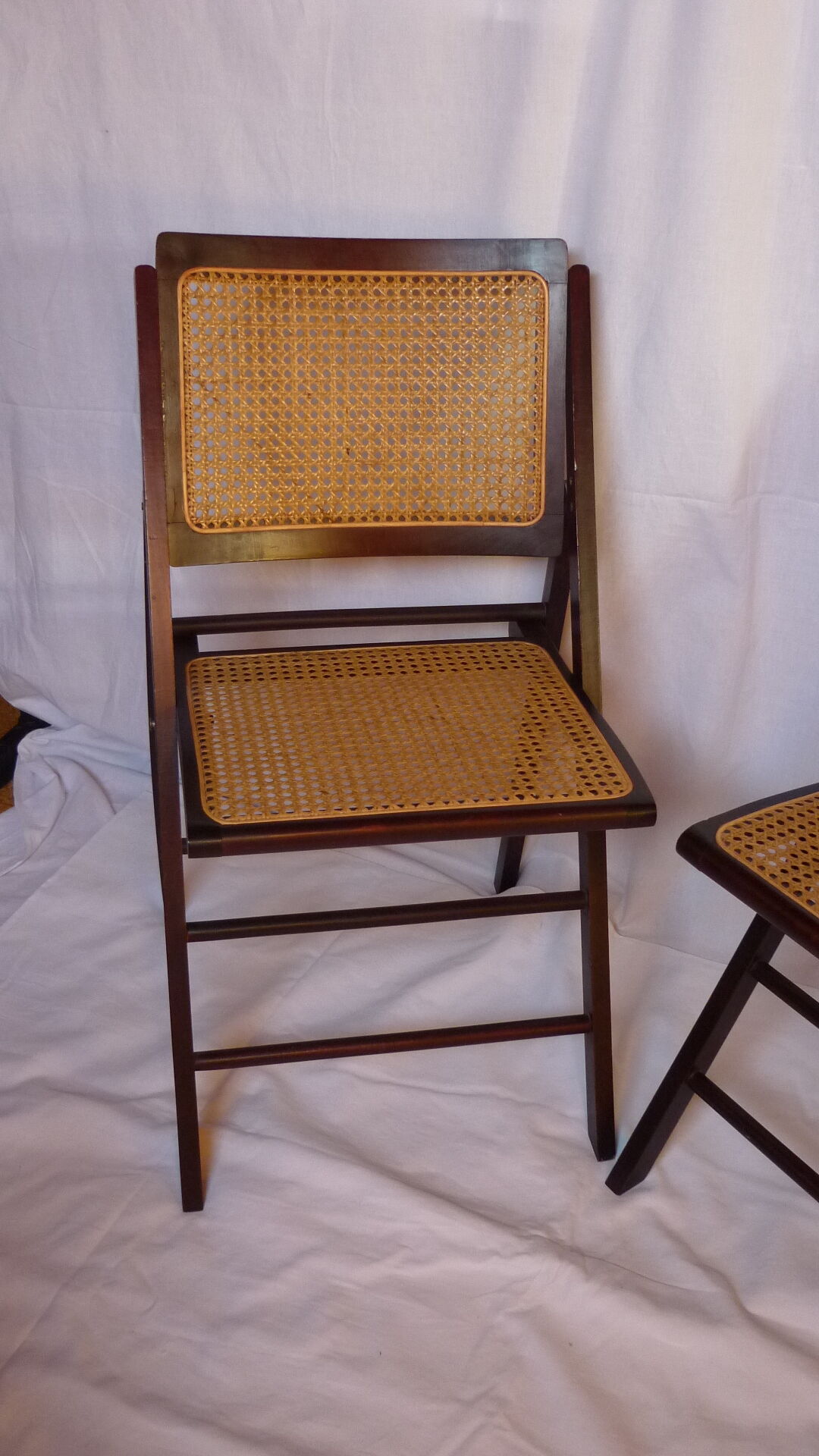 Duo of canned folding chairs