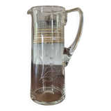 Blown crystal pitcher or carafe with floral motif and engraving