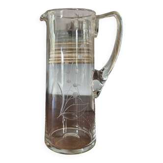Blown crystal pitcher or carafe with floral motif and engraving