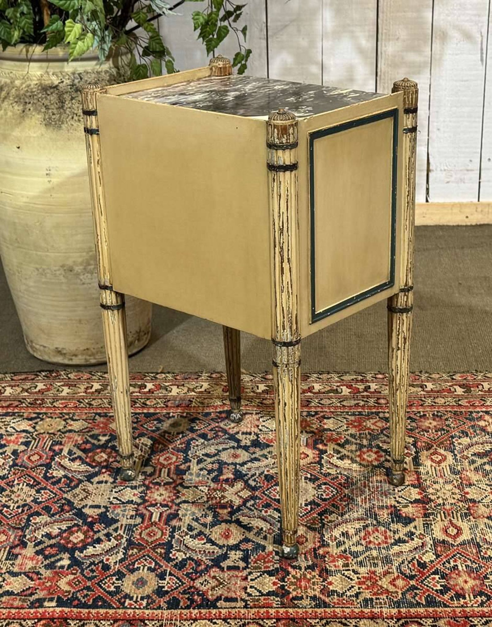 Beech bedside table painted with a marble top in Louis XVI style from the late 19th century.