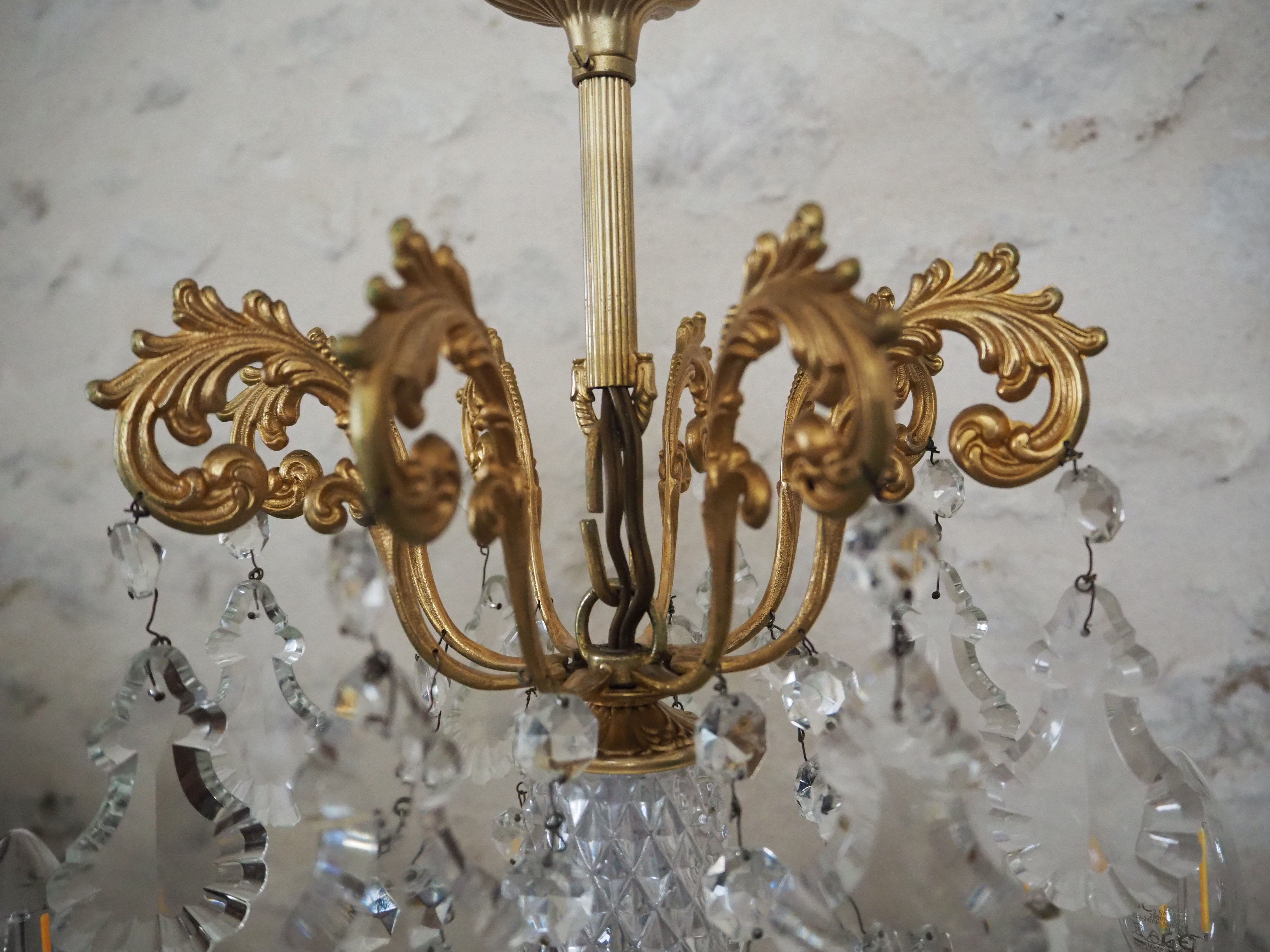 Chandelier 12 lamps with grapevines in crystal, bronze and regulated