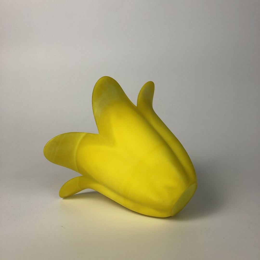 Small vase made of yellow glass paste, tulip shape blooms