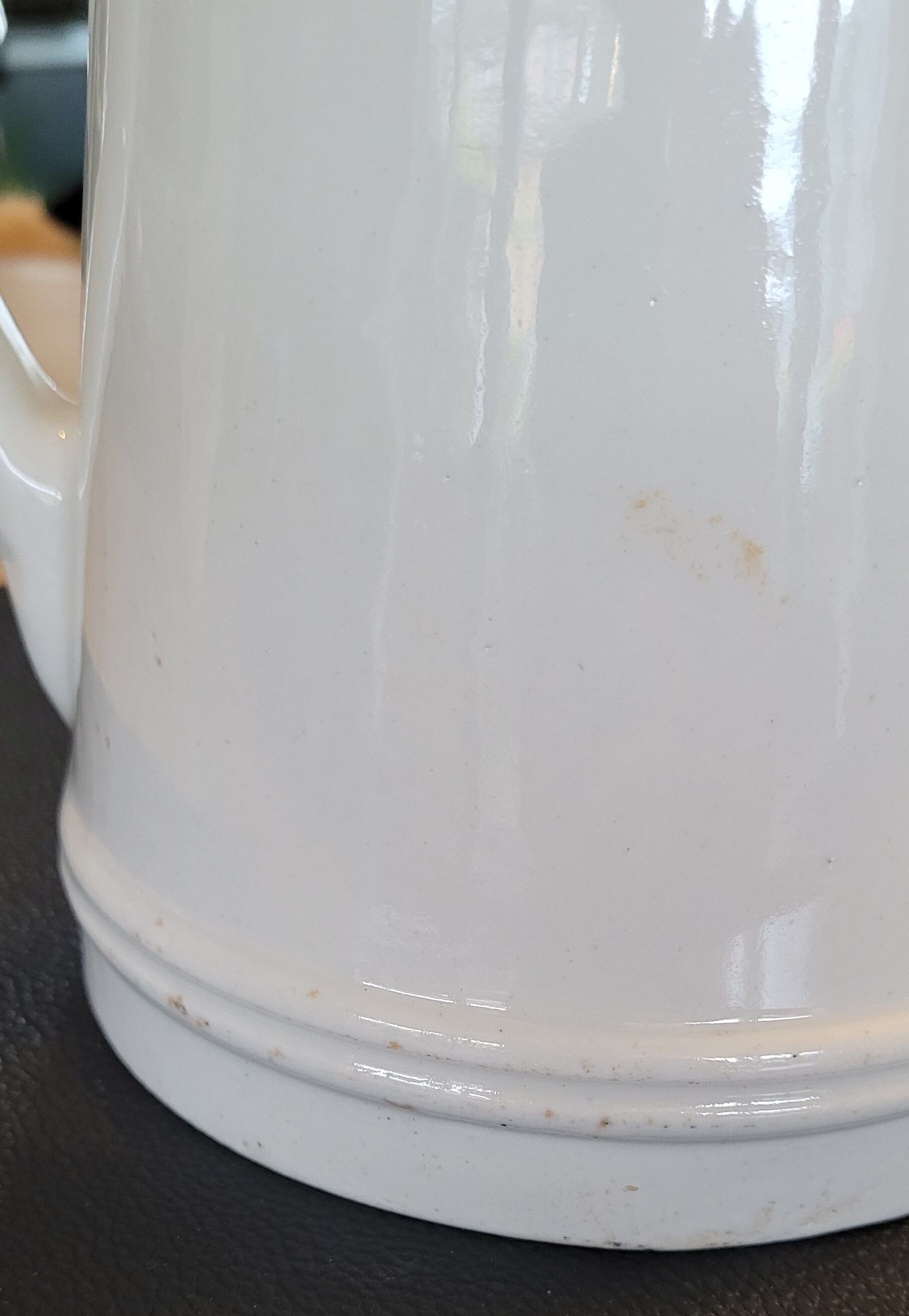 Cream glazed ceramic pitcher