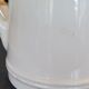 Cream glazed ceramic pitcher