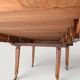 Large oval table from the early 19th century in walnut, 3.17m with extensions.