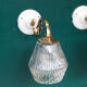 Pair of brass gooseneck wall sconces and glass globe vintage porcelain rosette