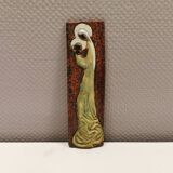 Slim relief with a motif of Madonna and child.