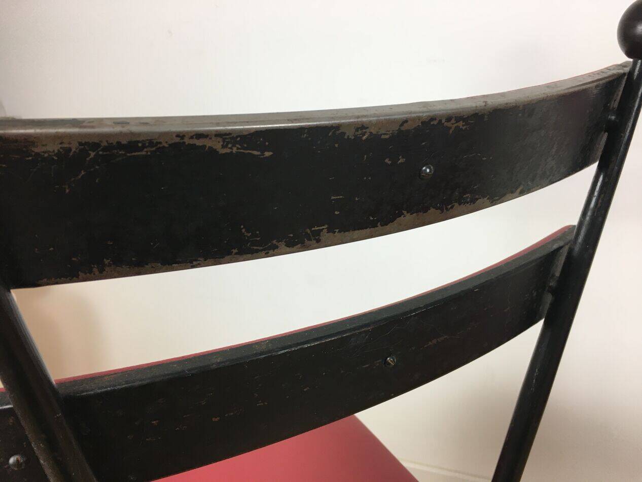 Pair of 1950s chairs in metal and red faux leather, Gueden-Adnet style.