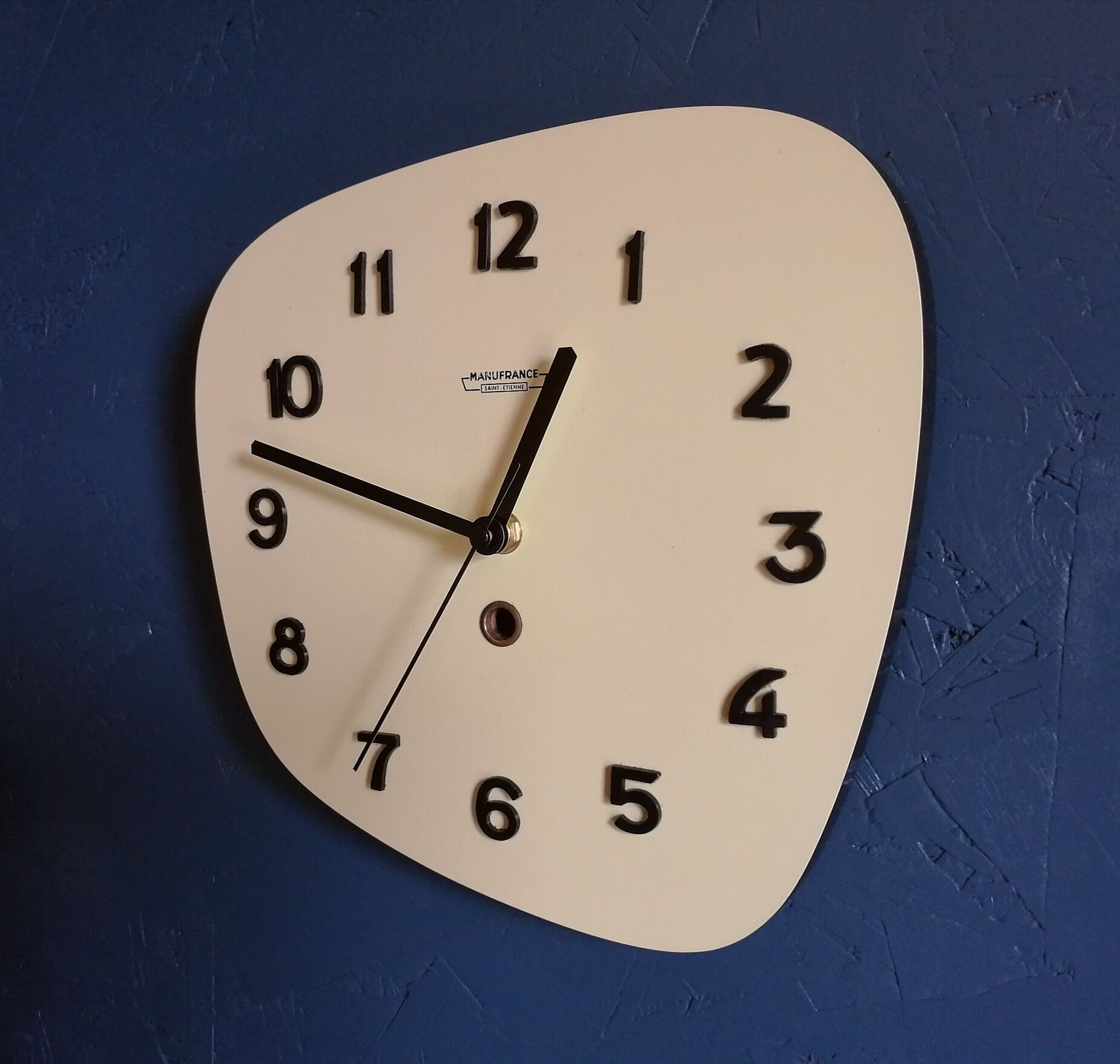 Clock formica vintage asymmetrical silent wall clock "Manufrance pale yellow"