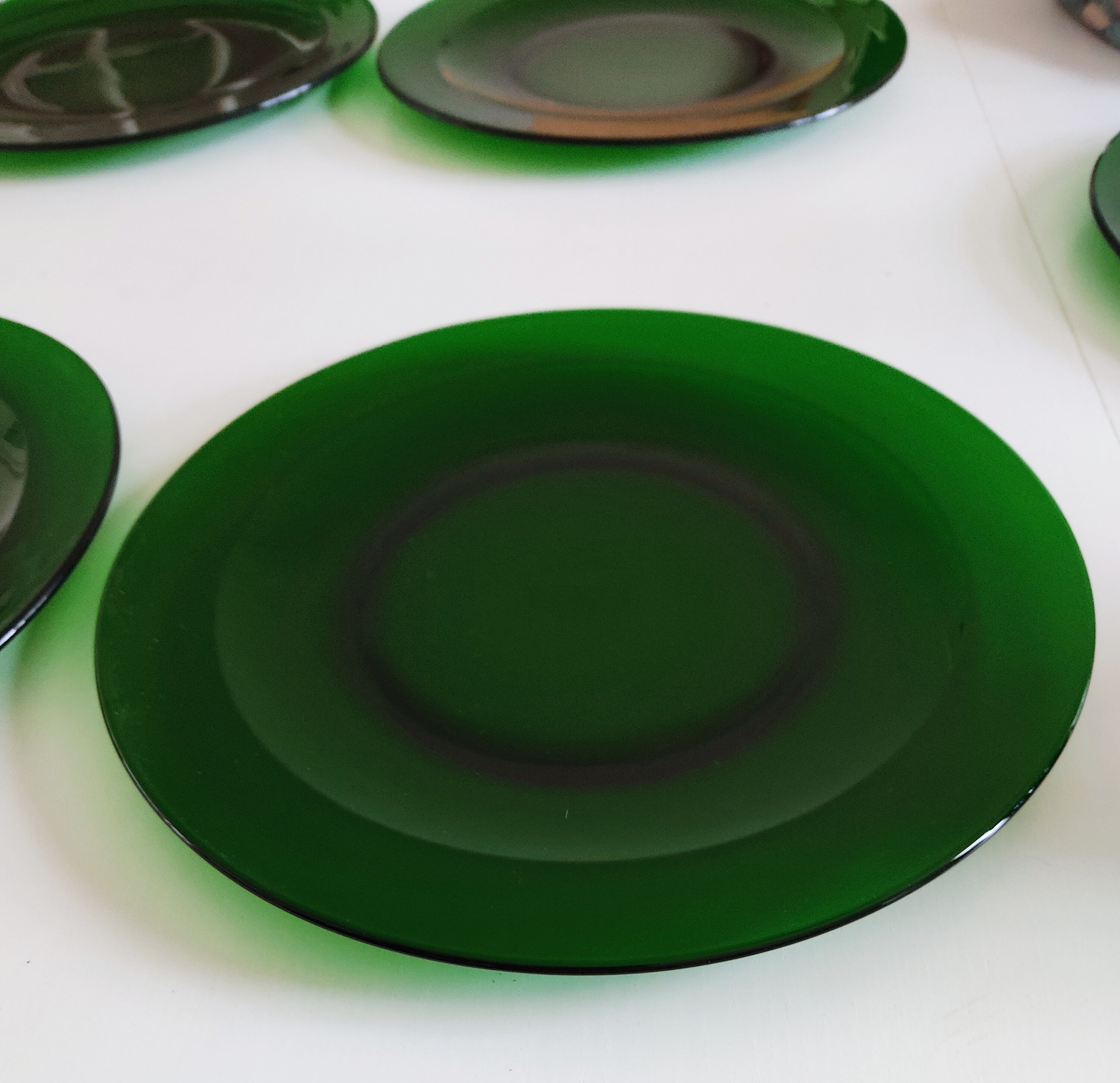 6 dishes in green glass