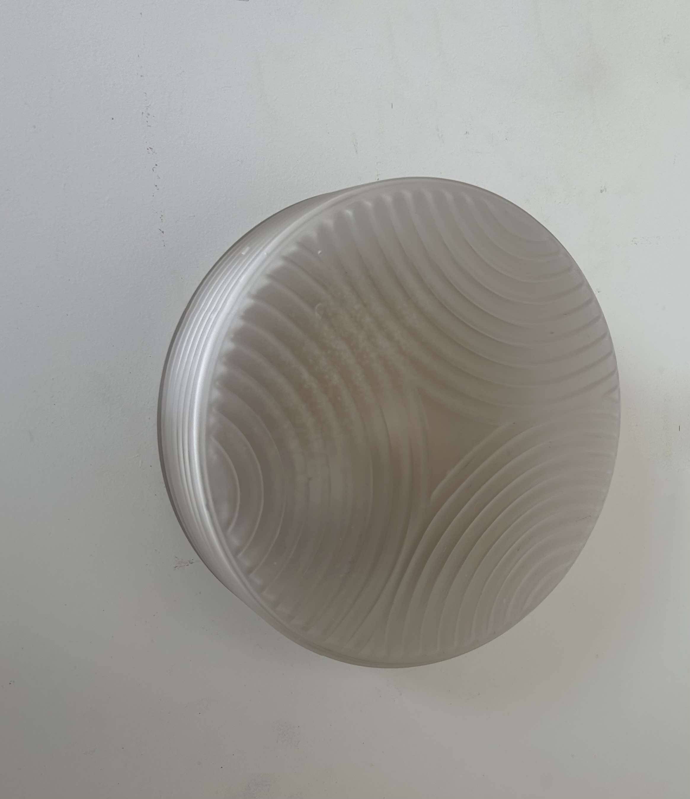 Vintage wall lamp in pressed molded sandblasted glass, France 1960