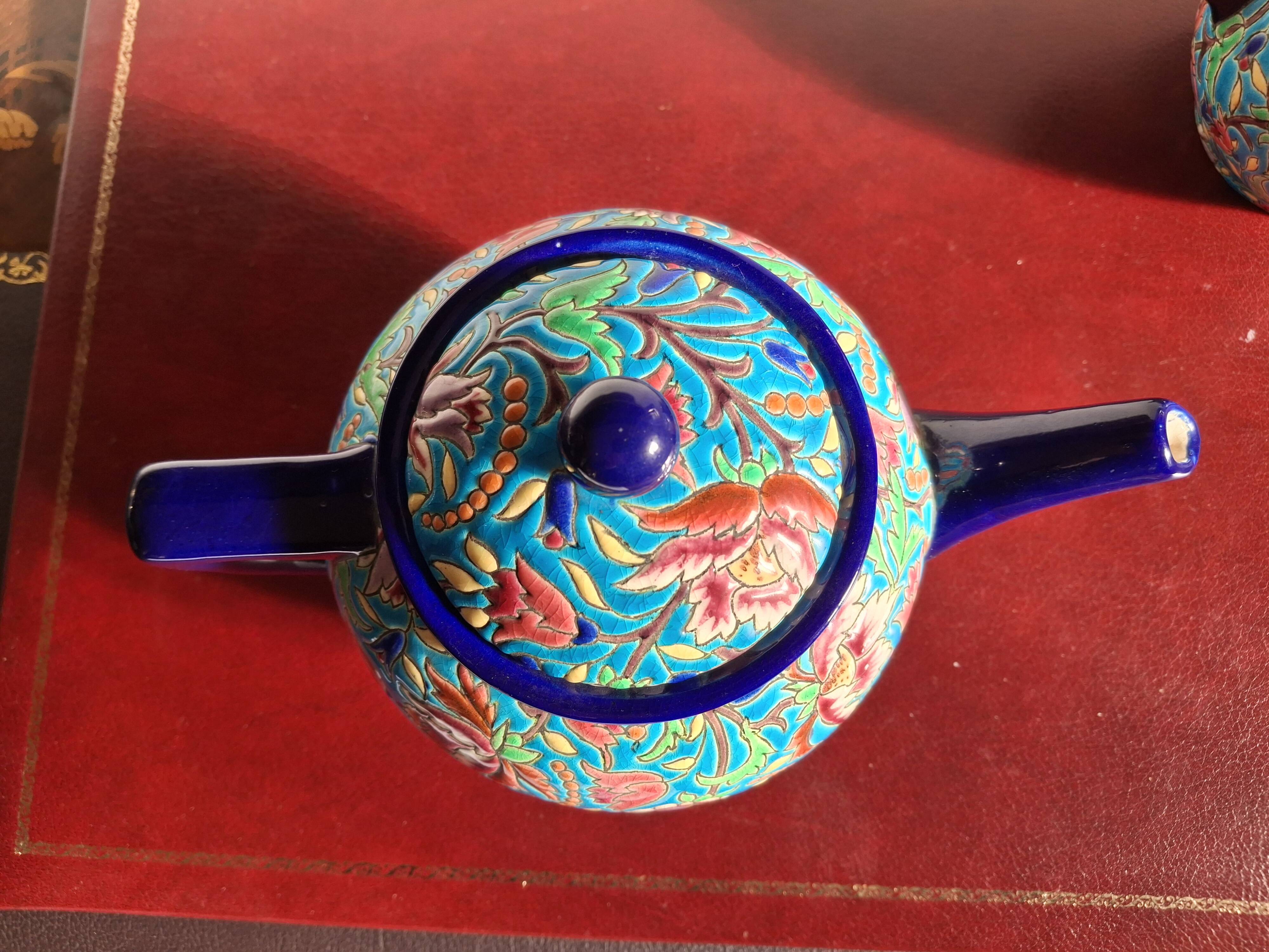 Cloisonné enamel tea service from Longwy in excellent condition.