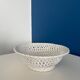 Openwork white ceramic bowl - Elegant and timeless centerpiece
