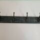 Coat rack in patinated wood and cast iron hooks